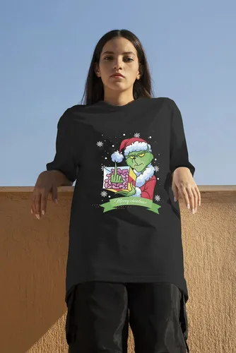 D_866465-MLU80560550492_112024-O.jpg Remera: Grinch Dedo Medio